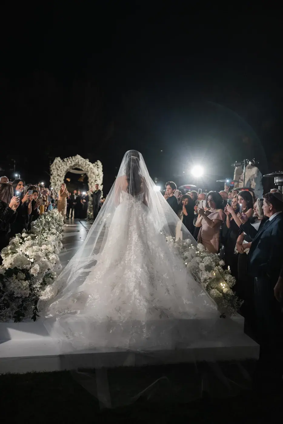 The bride's veil trailing down the aisle at the Four Seasons Hotel Westlake Village.
