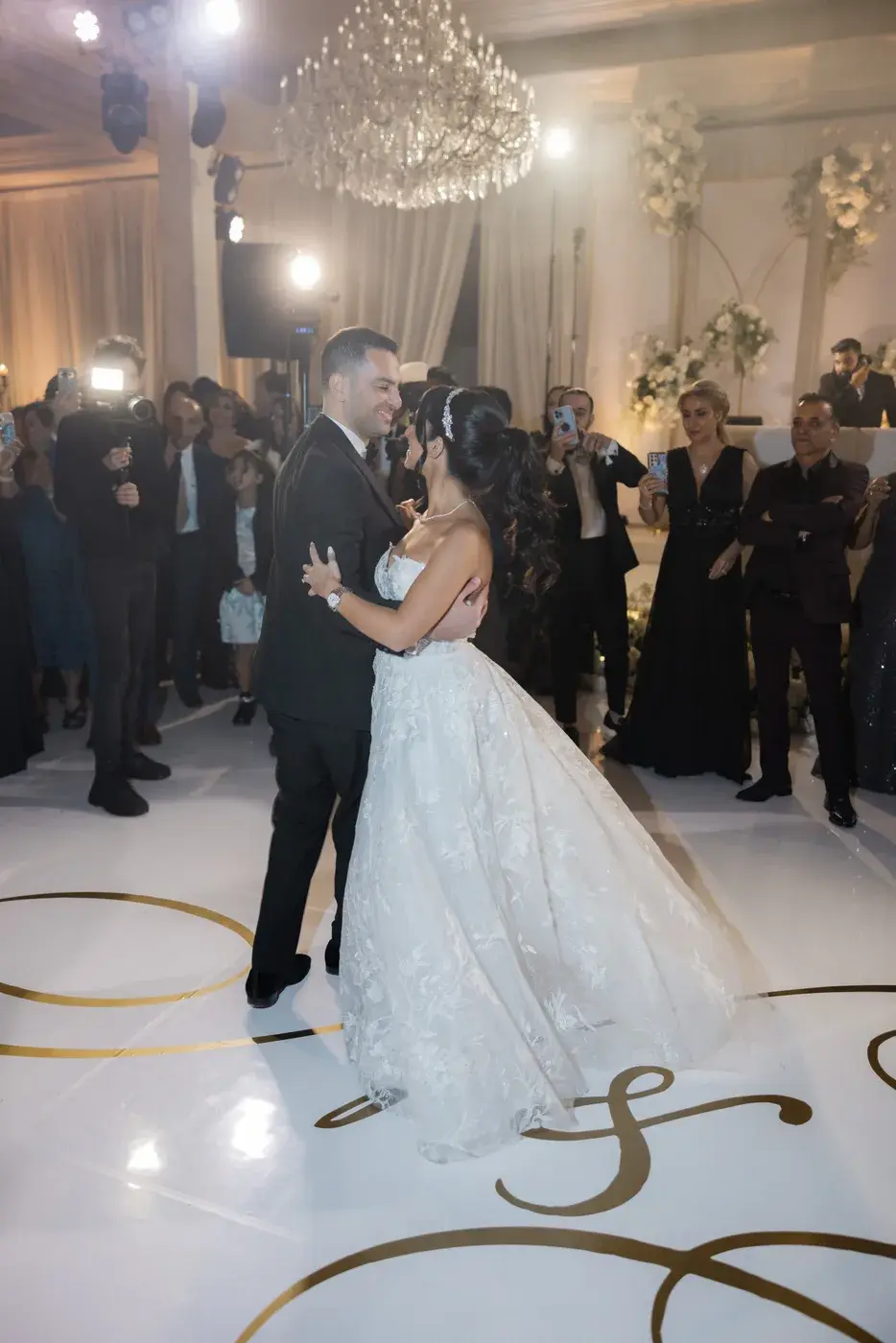 First dance under the chandelier with moving-head lighting at the Four Seasons Hotel Westlake Village.
