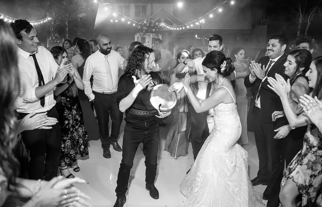 The bride takes over on the darbuka