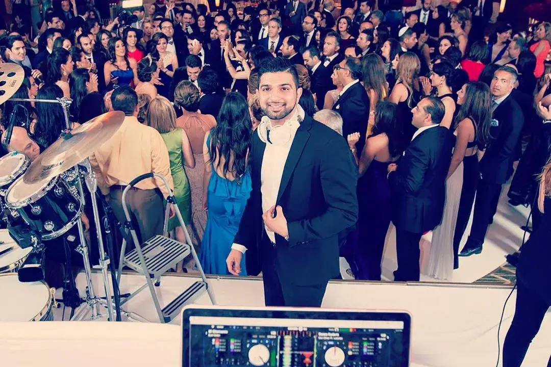 View from the DJ booth over a packed dance floor